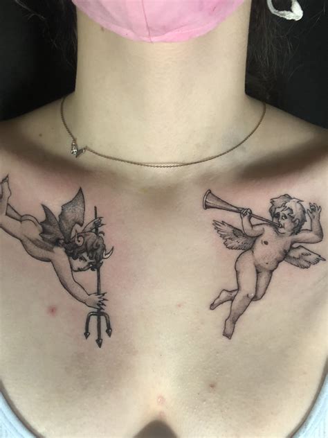 angel and devil cherub tattoo